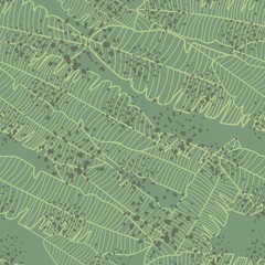Vhaotic banana leaf seamless pattern on green background. Jungle exotic plant wallpaper.