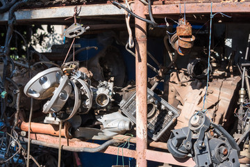 Fototapeta premium Old car spare parts for sale in garage