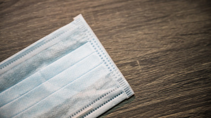 Surgical mask with rubber ear straps. antivirus medical mask for protection covid-19. Protection corona virus concept.