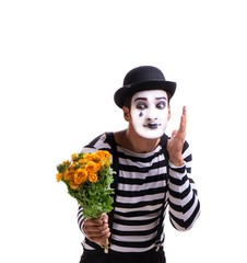 Mime with bunch of flowers isolated on white