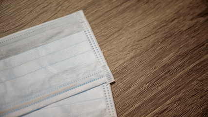 Surgical mask with rubber ear straps. antivirus medical mask for protection covid-19. Protection corona virus concept.