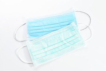 Blue sanitary mask  on the white background.