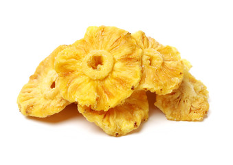 Dried pineapple rings on white background