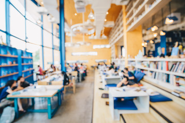 Blurred people co-working space in coffee shop