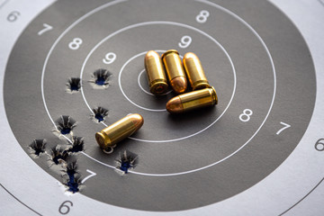 bullets on paper target for shooting practice