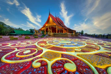 Fotobehang Bordeaux Mooi vloerpatroon als voorgrond bij Sirindhorn Wararam-tempel (Wat Phu Prao) in de provincie Ubonratchathani in Thailand.  © Jack