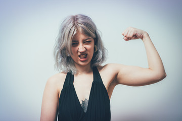 woman showing her muscles