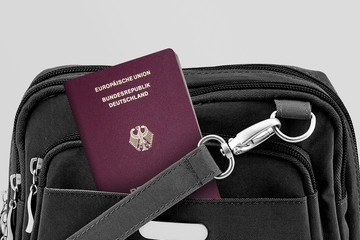 Close up of Austria Passport in Black Travel Bag Pocket