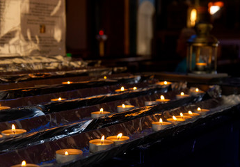candles in catholic church in fira