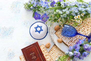 Pesah celebration concept (jewish Passover holiday). Traditional book with text in hebrew: Passover Haggadah (Passover Tale)