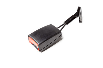 Black plastic seat belt lock with red button on a white isolated background. Safety in the car during an accident.