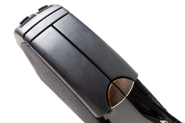 Spare part and interior element for the car is a black armrest with leather upholstery and an opening glove box on a white isolated background. Auto service industry.