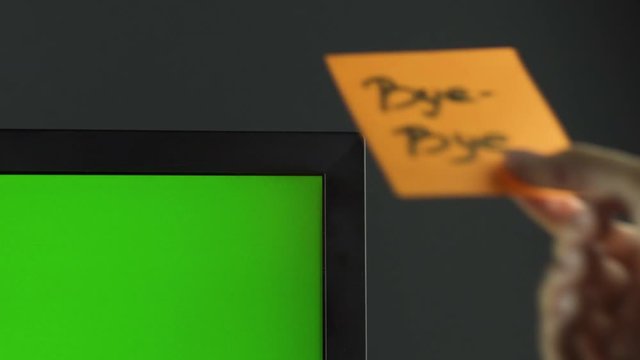 "Bye-Bye" sticker on pc, chroma key. Black background. Copy space. Communication