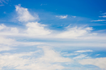 Naklejka na ściany i meble Blue sky background with tiny cloud