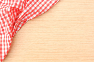 red tablecloth on wooden table
