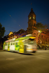 Melbourne architecture at night with city traffic