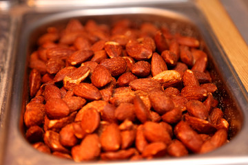 A close up image of smoked almonds