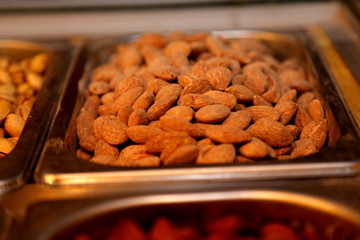 A close up image of smoked almonds