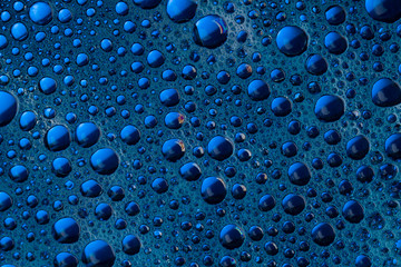 Blue bubbles abstract background . Soft focus
