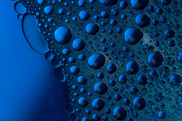 Clean Water And Water Bubbles In Blue. Blue bubbles abstract background . Close up