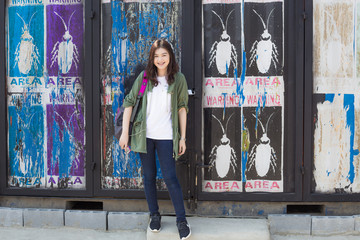 Asian student fashion women standing in art interior building