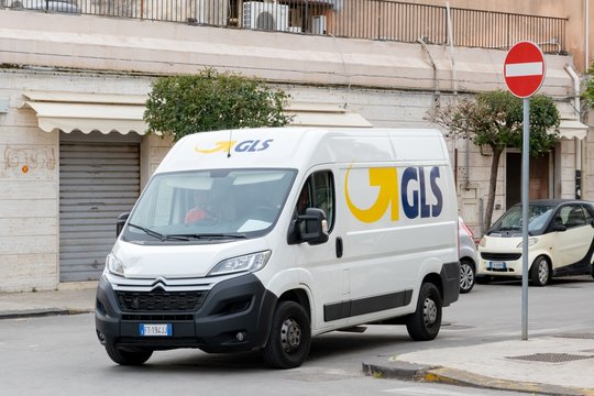 White Citroen Jumper van of the GLS delivery company parked on a street