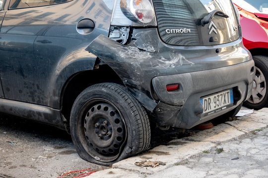 The damaged rear part of Citroen C1 car waiting to be fixed at a service centre.