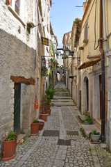 Guardia Sanframondi, Italy, 04/30/2018. A narrow street among the small houses of a medieval village in the Campania region