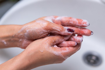 Fototapeta premium Compliance with sanitary standards during the quarantine period. Washing Hands. Cleaning Hands. Hygiene