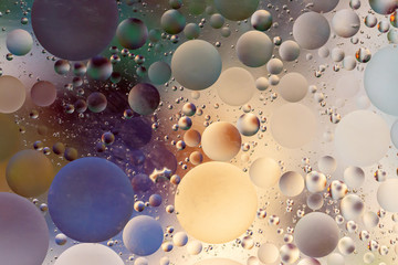 Colorful abstract background with oil circles/ Water bubbles close-up/ Oil bubbles in water/ Circle...