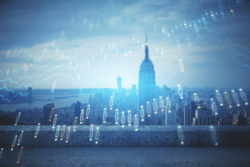 Fototapeta premium Forex graph on city view with skyscrapers background multi exposure. Financial analysis concept.