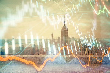 Forex graph on city view with skyscrapers background multi exposure. Financial analysis concept.