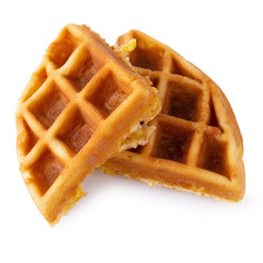 Freshly baked waffles isolated over white background.