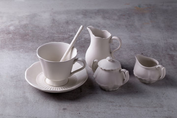 Teapot creamer, Cup and saucer on Cement Board