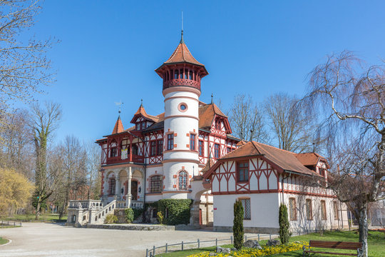 Herrsching, Bavaria / Germany - Apr 1, 2020: View on Villa Scheuermann (also known as Kurparkschl&ouml;sschen). Built in the years 1888 and 1889 for the artist Ludwig Scheuermann. Located in a public park.