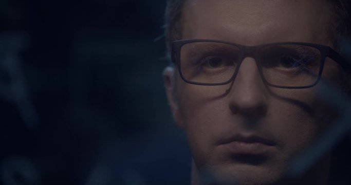 scientist at work writes the formula on the glass