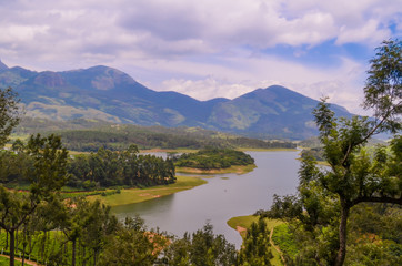 Fototapeta na wymiar Amazing Tea Plantations with Lake view at Munnar in Kerala.
