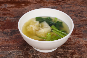 Asian traditional Wonton soup with herbs