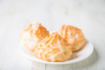 Homemade coconut cookies on a white table