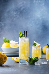 Fresh summer cocktail with lemons