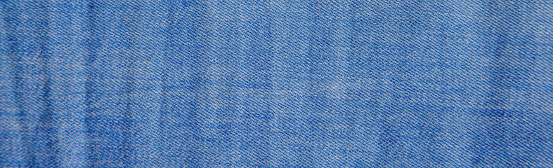 denim blue fabric close-up. Textured fabric background.