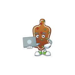 Diligent gingerbread bell mascot design style working from home with laptop