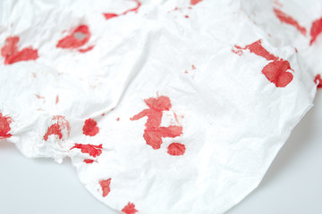 blood stains on a white paper