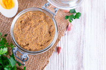 Chicken liver pate in glass jar, copy space