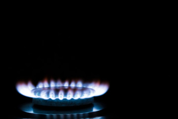 Burning gas, gas stove burner, hob in the kitchen.