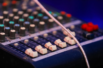 Music mixer control panel. Closeup