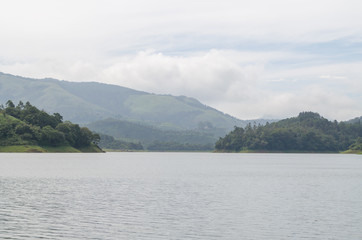 Fototapeta na wymiar Amazing Tea Plantations with Lake view at Munnar in Kerala.