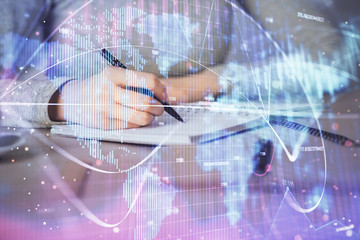 International business hologram over woman's hands taking notes background. Concept of success. Double exposure