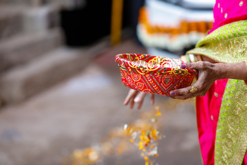 Indian wedding ceremony : bangle in bridal hand with mehandi design