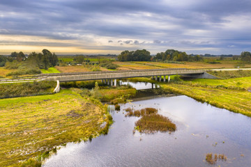 Fototapeta na wymiar River bridge with wildlife underpass